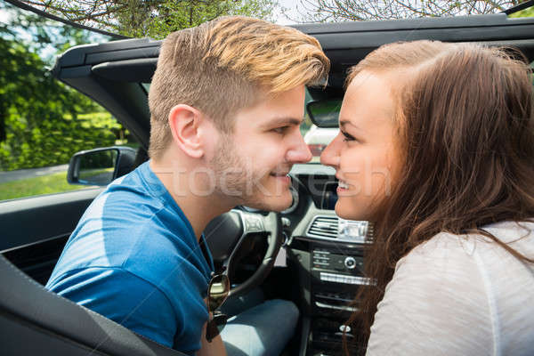 Couple Sitting In A Car Looking At Each Other Stock photo © AndreyPopov