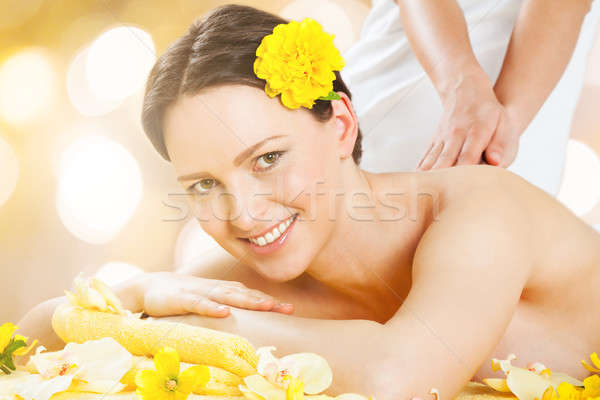 Woman Receiving Back Massage At Beauty Spa Stock photo © AndreyPopov