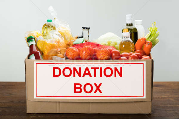 Alimentare donazione finestra completo generi alimentari tavola Foto d'archivio © AndreyPopov