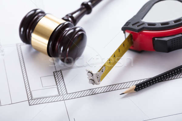 Gavel And Measuring Instrument On Blueprint Stock photo © AndreyPopov