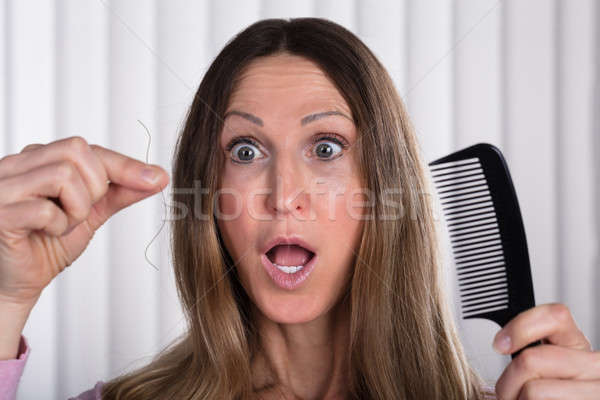 Megrémült nő haj szenvedés veszteség probléma Stock fotó © AndreyPopov