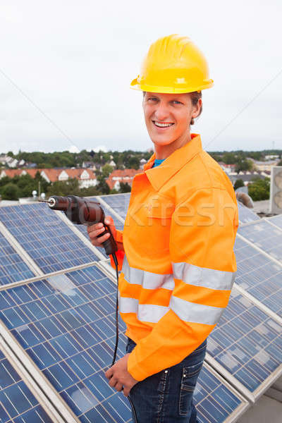 Stockfoto: Ingenieur · zonnepanelen · mannelijke · boor · machine