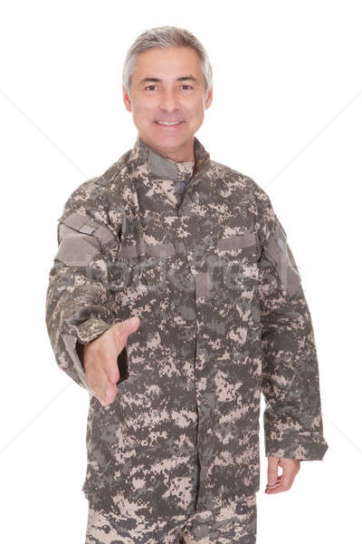 Mature Soldier Extending Hand To Shake Stock photo © AndreyPopov