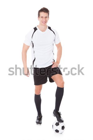 Foto stock: Feliz · masculino · jogador · de · futebol · jovem · futebol