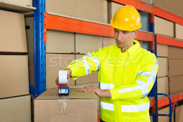 Worker Packing Cardboard Box Stock photo © AndreyPopov