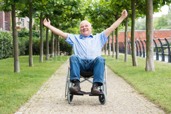 Happy Senior Man On Wheelchair Stock photo © AndreyPopov
