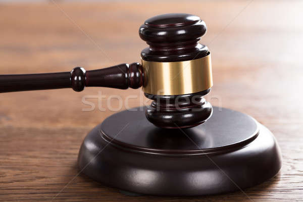 Gavel Striking On Desk Stock photo © AndreyPopov