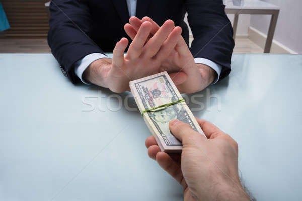 Close-up Of A Businessman's Hand Refusing Bribe Stock photo © AndreyPopov