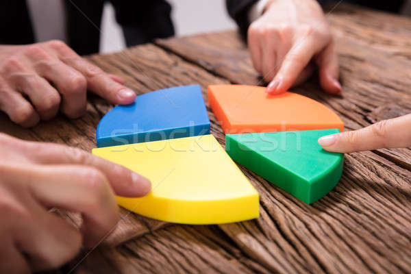 üzletemberek kapcsolódik darabok kördiagram színes fából készült Stock fotó © AndreyPopov