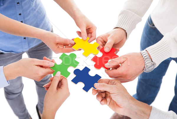 Fünf Personen Hand Puzzle halten farbenreich Stock foto © AndreyPopov