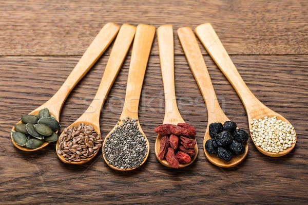 Superfoods In Wooden Spoons Stock photo © AndreyPopov