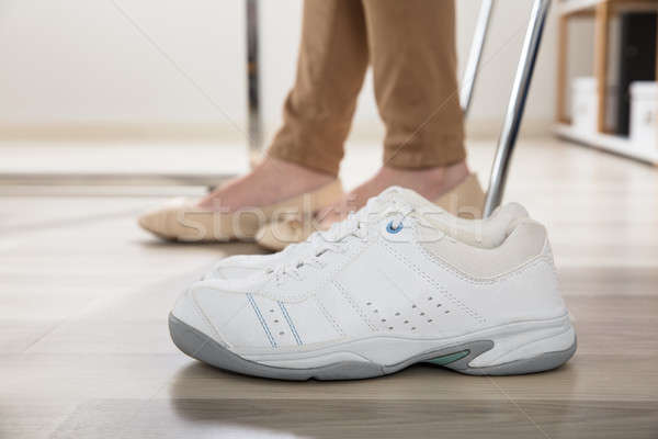Womans Sport Shoes In Office Stock photo © AndreyPopov