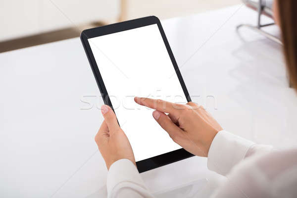 Businessperson Using Digital Tablet With Blank White Screen Stock photo © AndreyPopov