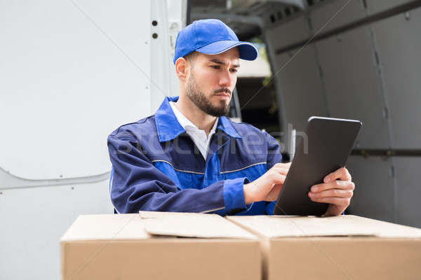 Male Worker Using Tablet Stock photo © AndreyPopov