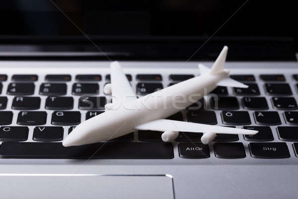 Kilátás fehér repülőgép miniatűr laptop numerikus billentyűzet Stock fotó © AndreyPopov