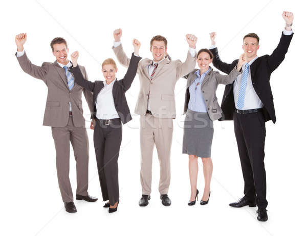 Excited Business People Cheering Over White Background Stock photo © AndreyPopov