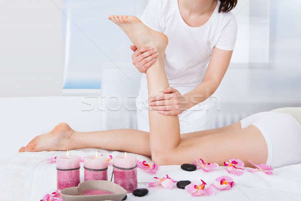 Woman Getting Feet Massage Stock photo © AndreyPopov