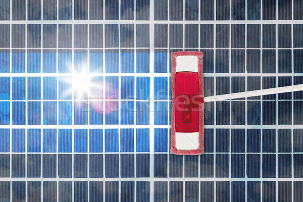 Cleansing Tool On Shiny Solar Panel Stock photo © AndreyPopov