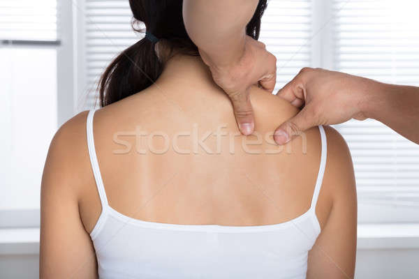https://img3.stockfresh.com/files/a/andreypopov/m/85/8496510_stock-photo-young-woman-receiving-shoulder-massage.jpg
