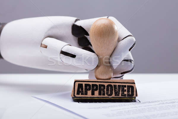 Robot Hand Approving Document Stock photo © AndreyPopov