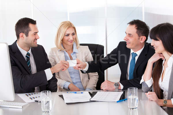 Two Businessman Exchanging Visiting Card Stock photo © AndreyPopov