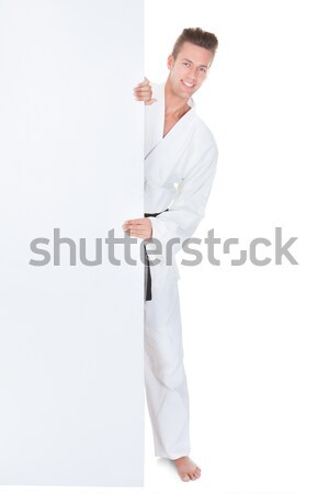 Jeune homme kimono blanche homme [[stock_photo]] © AndreyPopov
