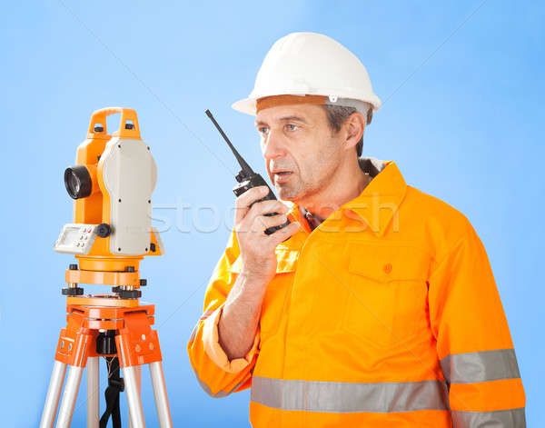 Senior land surveyor with theodolite Stock photo © AndreyPopov