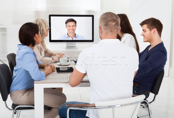 Business Team Attending Video Conference Stock photo © AndreyPopov