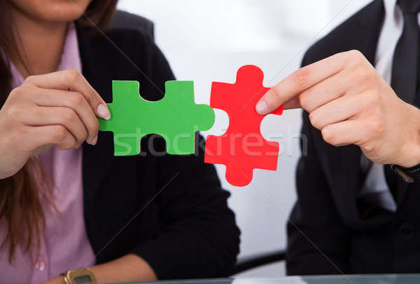 Hände Puzzleteile Bild Business Mann Sitzung Stock foto © AndreyPopov