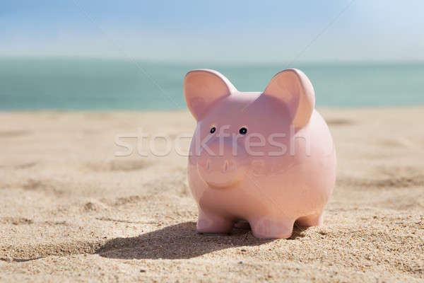 Piggy Bank On Beach Stock photo © AndreyPopov