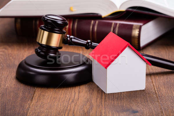 House Model With Gavel On Wooden Table Stock photo © AndreyPopov