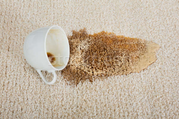 Coffee Spilling From Cup On Carpet Stock photo © AndreyPopov