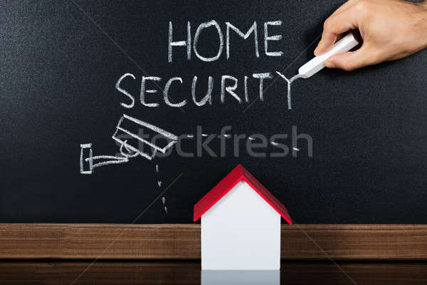 House Model With Home Security Concept On Blackboard Stock photo © AndreyPopov