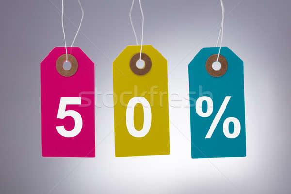Multi Colored Tags Showing Fifty Percent Stock photo © AndreyPopov