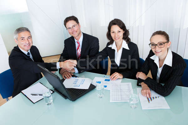 Colleagues congratulating one another Stock photo © AndreyPopov