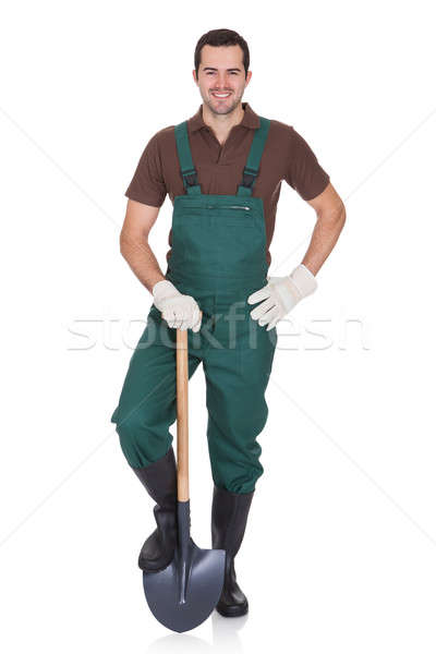 Happy young gardener in dungarees Stock photo © AndreyPopov