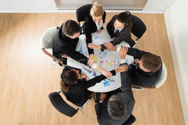 Businesspeople Joining Hands Stock photo © AndreyPopov