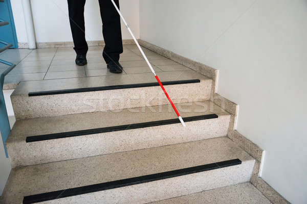 Blind Man Moving Down On Stairway Stock photo © AndreyPopov