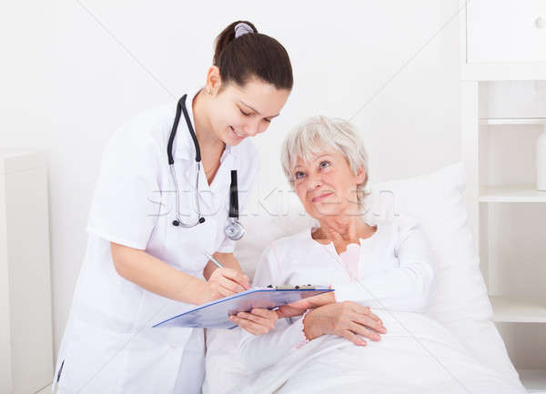 Doctor Giving Prescriptions To Patient Stock photo © AndreyPopov