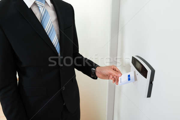 Businessperson Hands Holding Keycard Stock photo © AndreyPopov
