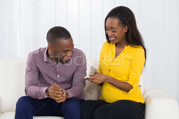 Young Expectant Couple Looking At Pregnancy Test Stock photo © AndreyPopov