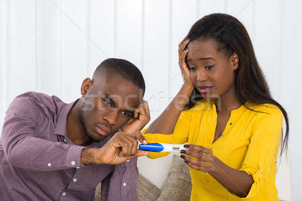 Couple Looking At Pregnancy Test Stock photo © AndreyPopov