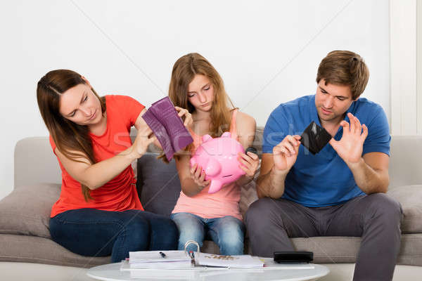 Family Checking Their Savings Stock photo © AndreyPopov