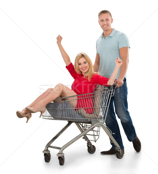 Couple Having Fun With A Shopping Cart Stock photo © AndreyPopov