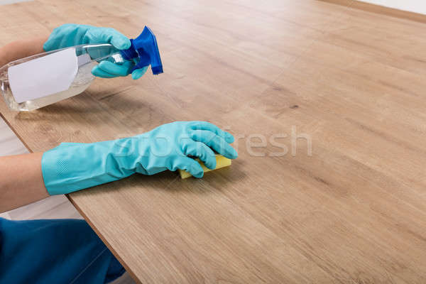Person Wearing Glove Cleaning Kitchen Worktop Stock photo © AndreyPopov