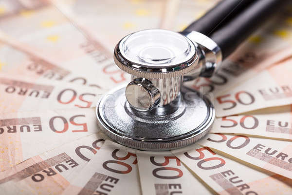 Sztetoszkóp Euro bankjegy közelkép papír orvosi Stock fotó © AndreyPopov