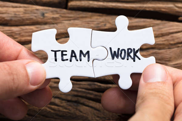Hands Connecting Team Work Jigsaw Pieces Stock photo © AndreyPopov