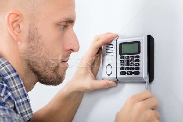 Male Technician Installing Security System Stock photo © AndreyPopov
