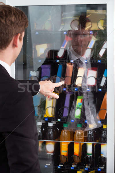 Man pointing towards window display Stock photo © AndreyPopov