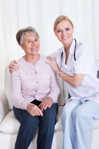 Portrait médecin patient séance canapé jeunes [[stock_photo]] © AndreyPopov